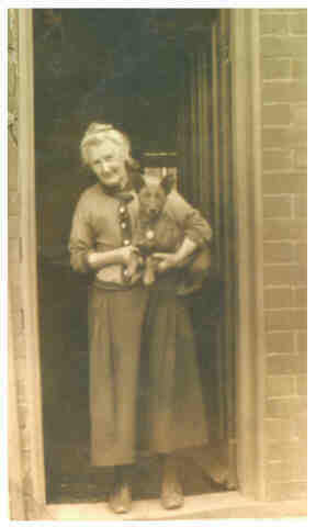 Lady with dog, Main Street, Paull