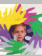 Bobby's hand cutouts in a wreath around his photo