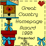 Great Country Homepage Award with country bird house decorated with bows