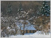 a scenic country picture with a barn and snow