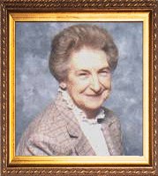 a framed photo of my mom