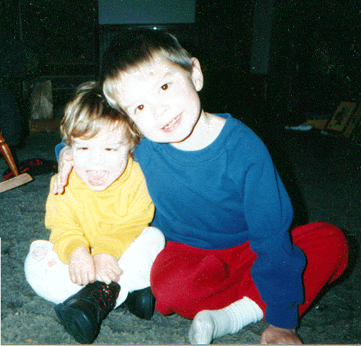 Jim and Emily sitting together on floor