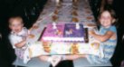 This Is Angel (1st Daughter) And Sabrina (2nd Daughter) Sitting By Their Cake At Chucky Cheese In Idaho On Their 5th & 2nd Birthday Party In 1999!
