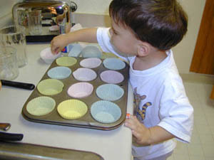 Arranging cupcake holders. [22,245 bytes]