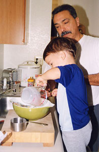 Pouring milk into the bowl. [28,672 bytes