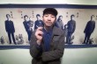 Reconstructing family history: Shao Yinong stands in front of a section of the photographic family tree exhibition. Shao believes in retracing roots lost during the Cultural Revolution. Agence France-Presse photo