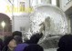 A Russian young man pastes a coin to an ice sculpture of horse to greet the upcoming Year of the Horse mid-night December 31, 2001 in Moscow. In recent years, the Chinese custom of using any of the twelve animals representing the twelve Earthly Branches to symbolize a year is getting more and more popular in Russia. Xinhua Photo  