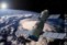 An artist's concept shows how the Shenzhou 2 capsule might appear as it circles Earth. Image by Simon Zajc for Space.com. 