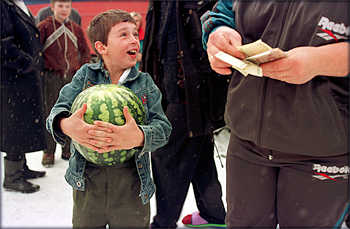 Bringing fresh foods to people living in the interior of Russia has proven to be a successful money-making venture for entrepeneurs working the rails. (William Snyder)