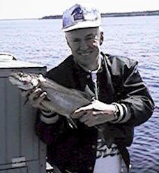 Hank holding 4 pounder on Sebago Lake