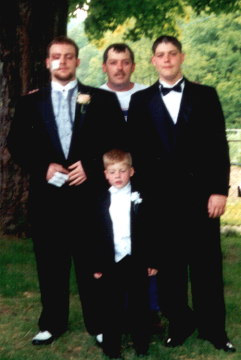 Dwayne, his dad, brothers Justin and Austin