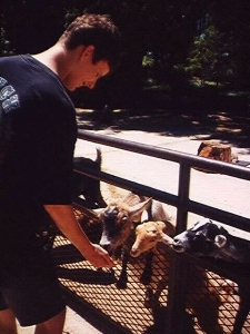Sean feeding goats