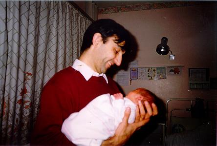 Dad holding his son