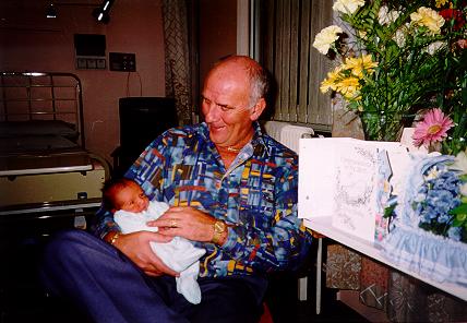 Grandad Hillman holding Nathan