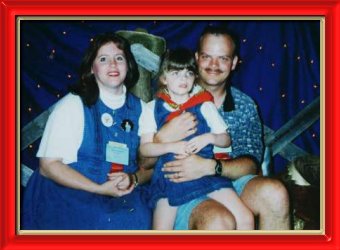 Katie, Mommy and Daddy at the conference