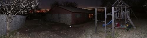 Late evening panorama of the backyard, garden, and Jada