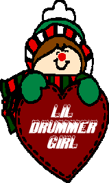 little boy behind a red heart, text reads little drummer girl