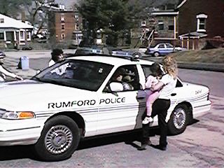 Doug In His Cruiser Talking to Haley and Deb.