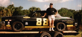 Picture of racing car and John