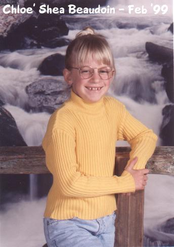 Looking sophisticated in her new glasses.
