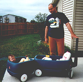Stephanie in her wagon September, 1996