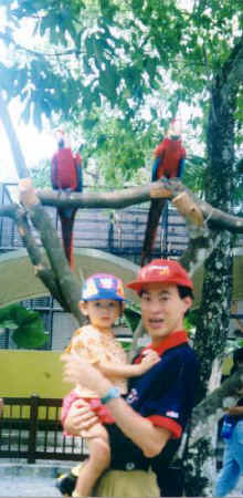 With 2 parrots at KL Zoo - 7 Nov. 1999