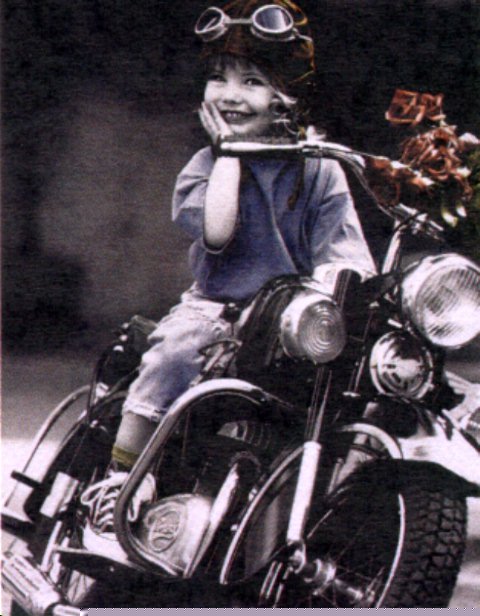 Little girl on a motorbike