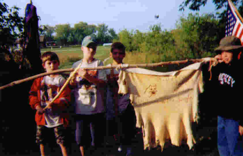 Each scout group made their own flag.  The camp theme was 'Jungle Book' and Gus's group was 'Bagheera.'  The flag says 'Welcome to the Jungle.'