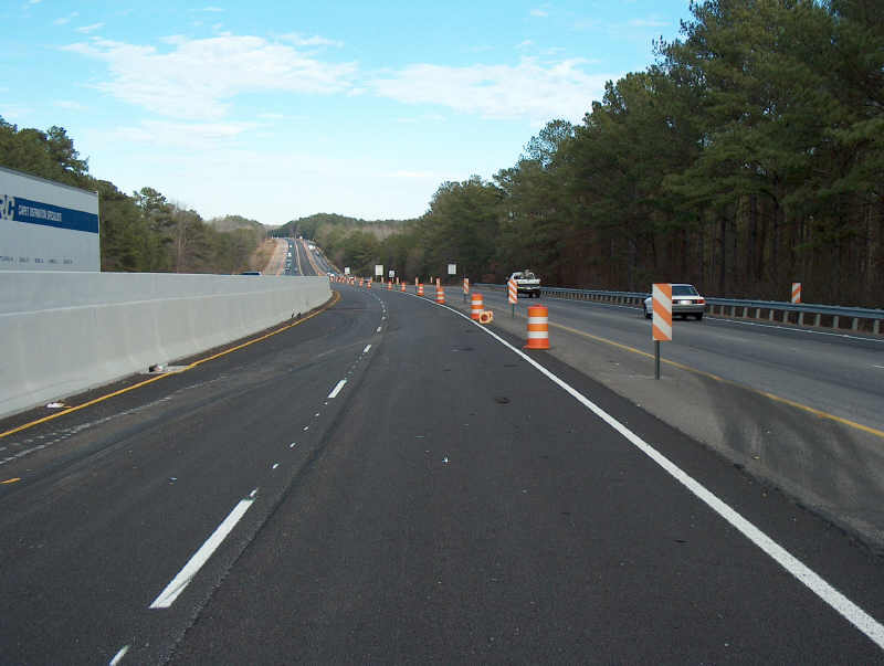 four lanes on each side of the barrier