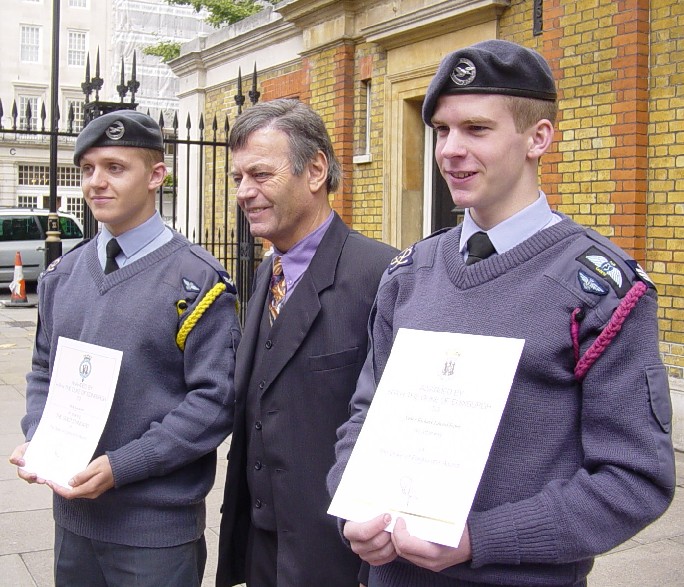 Cpl Kyriacou and FS Brown recieve their Gold Duke of Edinburgh's Award from DJ Tony Blackburn