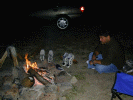 Scott, drying his shoes by the fire