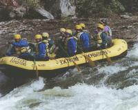 Chris (front left) Scott (front right) and Buck (thrid from front on left) rafting down the Lower Gauley