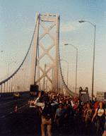 a gaggle of hikers on the bay bridge