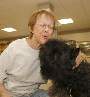 Splash doing hospital therapy work with  patient