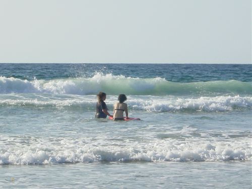 Daphne is teaching Gillian to play the boogie board!