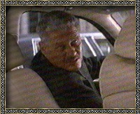 Mischa as Crown's Driver in The Thomas Crown Affair