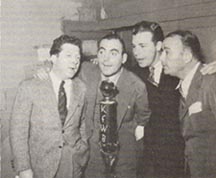 Frank McHugh with Pat O'Brien, Dick Powell, and Robert Armstrong