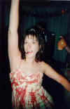 Kelley (as Carrie) grovin' to the tunes