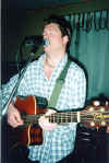 Travis sings acoustic