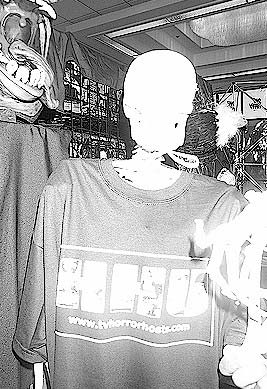 No, this isn't Ghastlee Ghoul modeling the HHU shirt...it's a skeleton donated to THE HAUNTED THEATRE by TheDeadShallRise.com