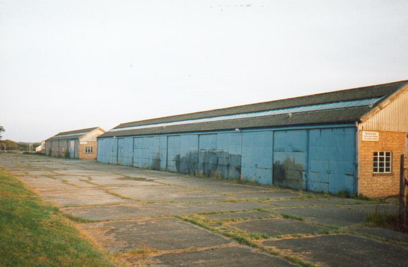 (c.1996) A better view of the sheds from near the side gate, the large blue doors slide over each other to open up access to drive vehicles inside for storage and maintenance work