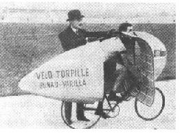 1910 fully faired Diamond Frame bike. The fairing made them so fast they were band for races. I think it was a consiracy to keep bikes slow so that they wouldn't compete with cars. This was just before WW1 when cars were young and a very good speed was 40 mph (67kph) these bikes did 30mph (50kph)