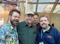 Dave with coworkers and a stalker