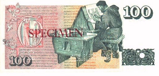 Monk copying a manuscript.