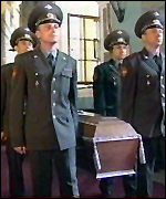 coffins carried