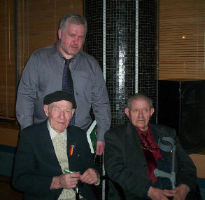 Ciaran Crossey photographed with Bob Doyle and Michael O'Riordan