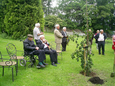 Jack and Bob at the tree planting - to mark the visit.