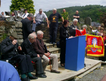 A young relative of GB reading out a poem about him.