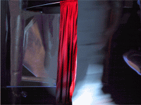Red Curtain  - Installation 4x8x6 feet: steel metal sheeting, steel wire, plywood, fiber glass, sona tubes, roller casters, theatre lighting, hazer, fabric