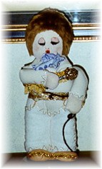 The "Hair" on the Doll is actually Blond... it photo'd Dark